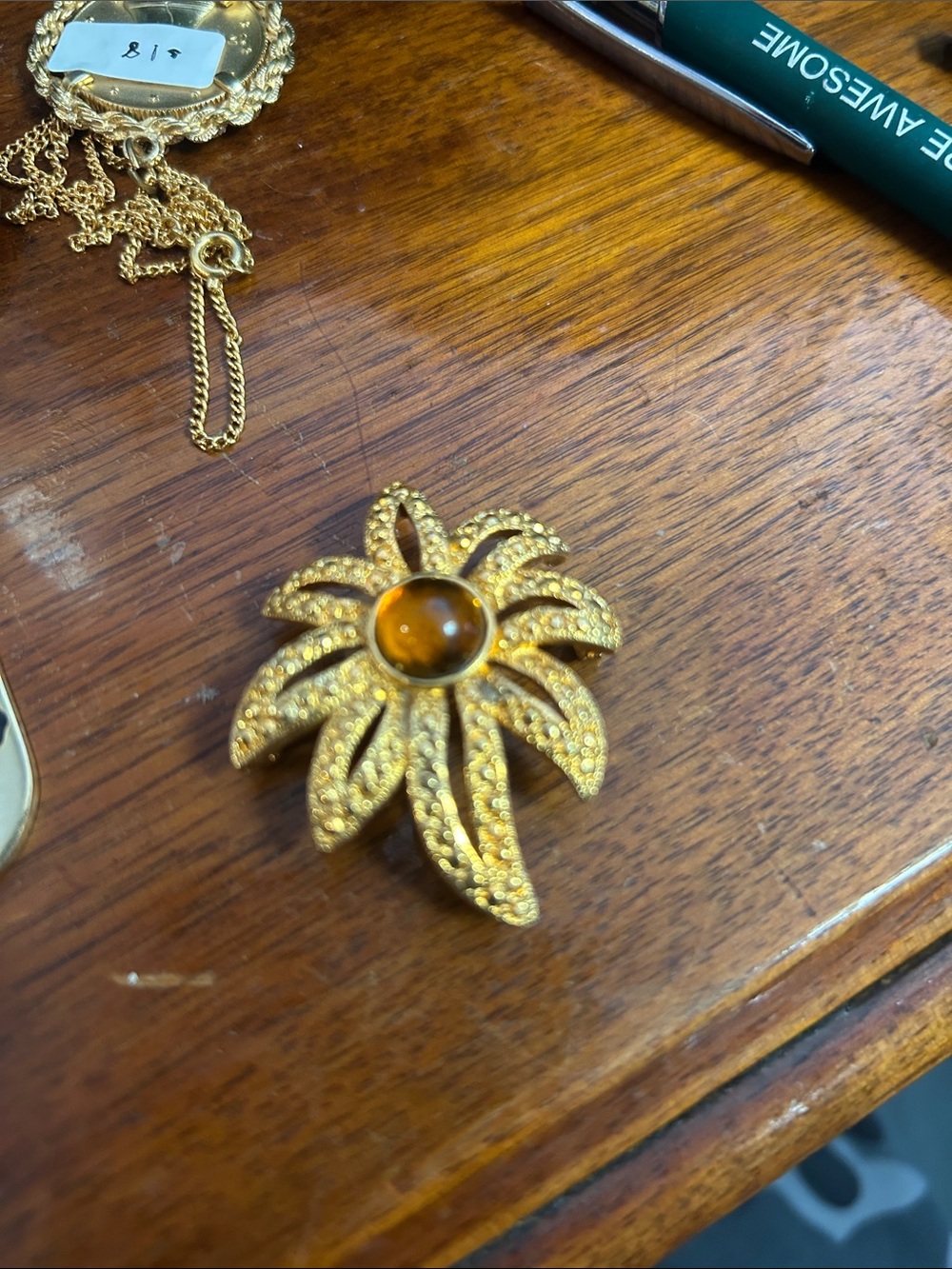 Gold Floral Brooch with Amber Center